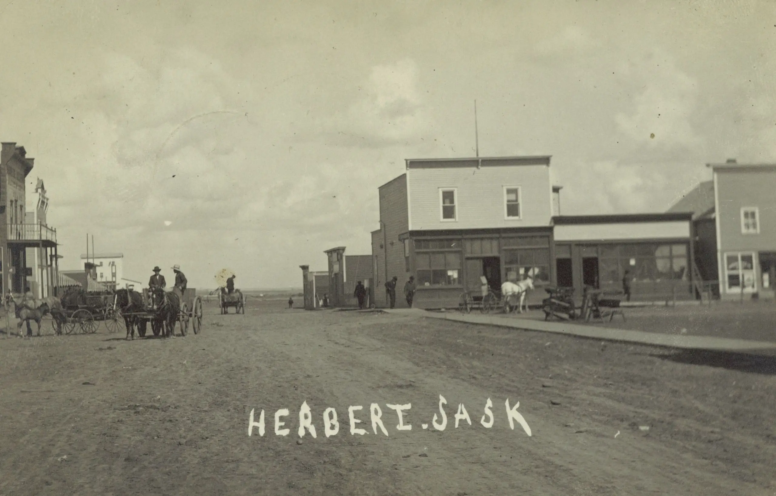 Street scene with horse-drawn wagons