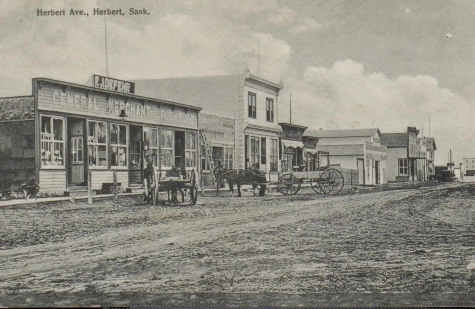 Herbert Avenue street scene with general merchant store and horse-drawn wagons